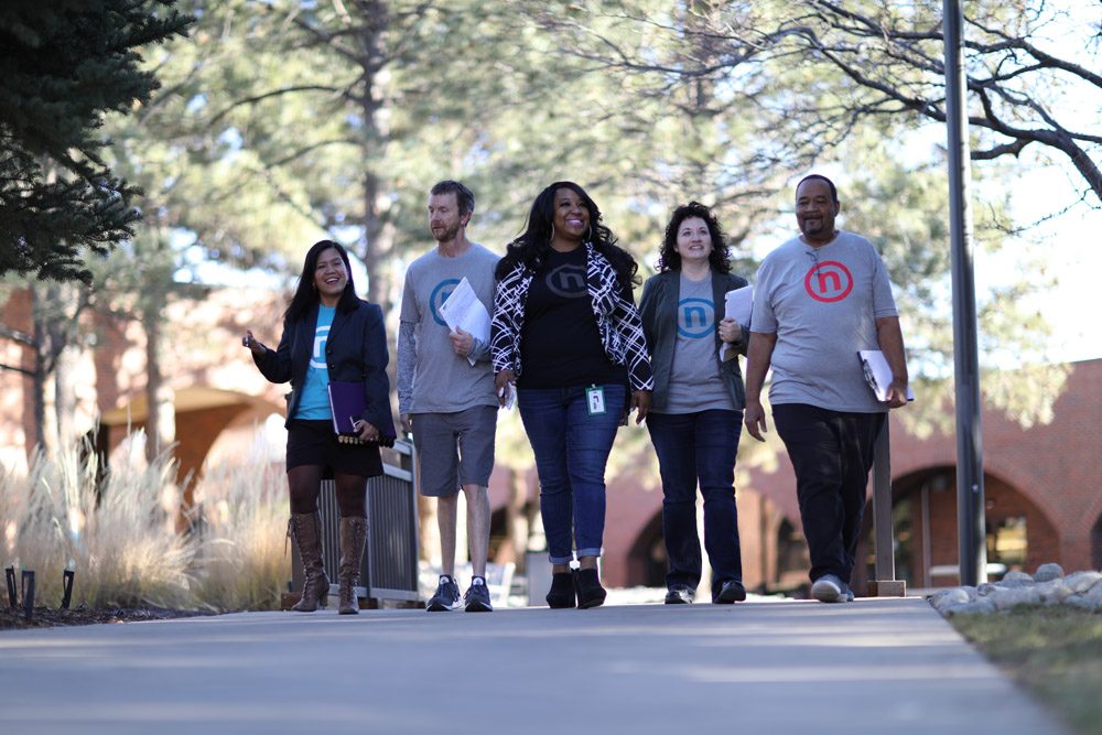 Nelnet associates take part in the wellness program by walking together